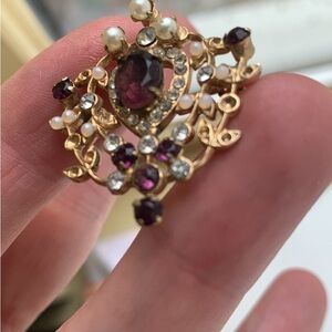 Garnet and rhinestones vintage pin. Some loose stones offers accepted